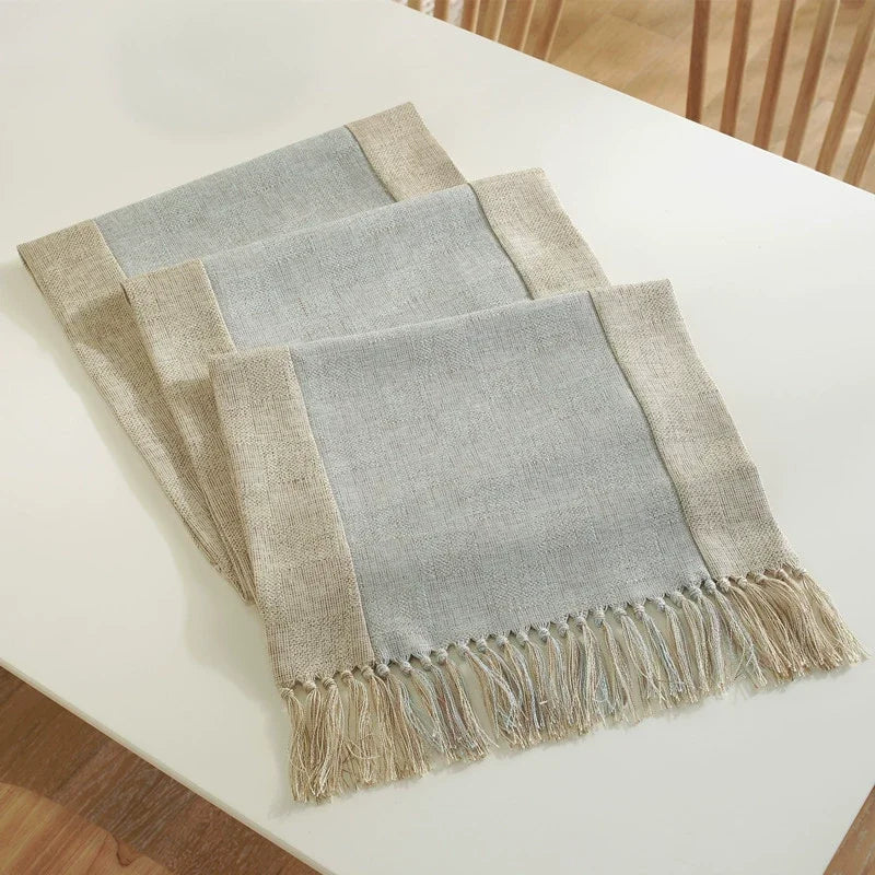 nappe tissée franges scandinave minimaliste gris beige vertebranches verte plante verte pot artwork encadré