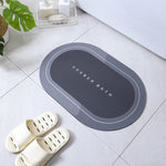 tapis bain moderne ovale motifs pas couleurs bleu marine gris clair rose violet texture