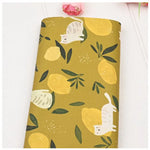 tissu coton imprimé citrons feuilles chats illustration simple vert olive marron blanc beige clair