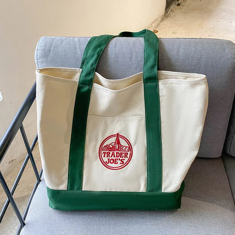 sacs toile colorés blanc vert violet rouge jaune logo trader joes poignées tissu casual