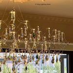 lustre cristal transparent argenté classique branches lumineuses chambre salon