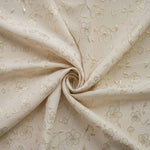 tissu brodé fleurs blanches vert clair beige polyester largeur 140cm opacité résistance intempéries respectueux