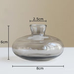 vases hydroponiques modernes transparents marron lisses décoration table plantes fleurs artificielles minimalistes