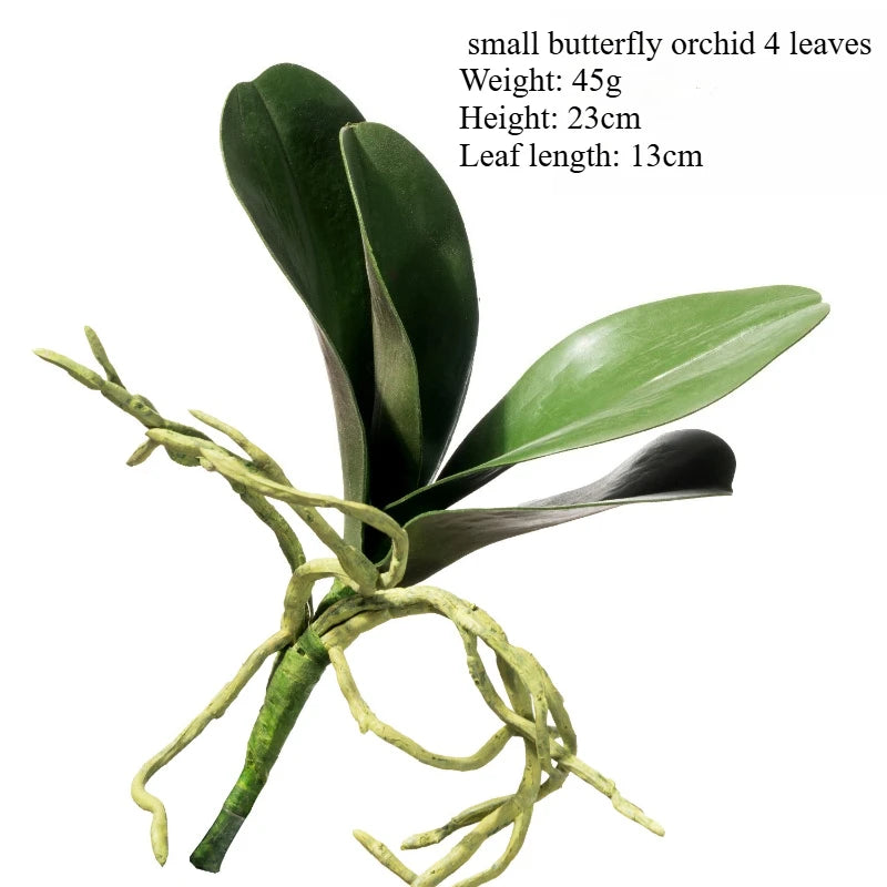 plantes artificielles vertes feuilles larges nervures dorées décoration intérieure moderne minimaliste pot verre support