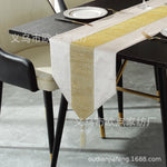 nappe décorative moderne tissu uni strass central franges couleur noir rouge or élégante table