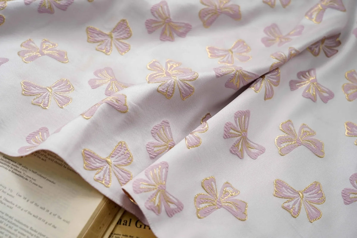 tissu polyester rose clair papillons doré noir moderne élégant coudre bricolage respectueux environnement Jacquard