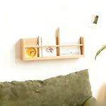 étagères murales bois naturel minimaliste horloge cadre photo vase lunettes plantes chambre salon