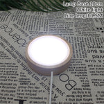 lampe poser moderne bois naturel couleurs chaudes blanc orange vert translucent câble usb commandes