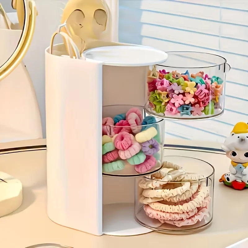 rangement rotatif blanc rose pâle transparent moderne accessoires capillaires brosse poudre rubans élastiques minimaliste