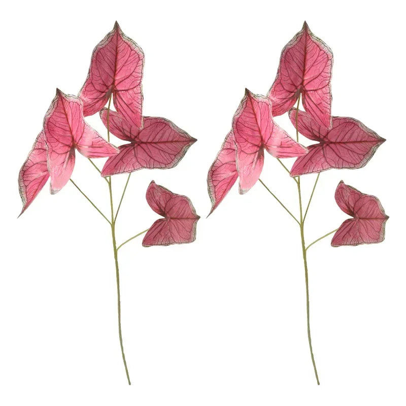plantes artificielles rose vert veines blanches modernes vase transparent plateau beige figurine dorée exposantextérieur