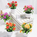 décoration intérieure moderne fleurs artificielles pots blancs feuilles vertes minimaliste exposition chambre fête
