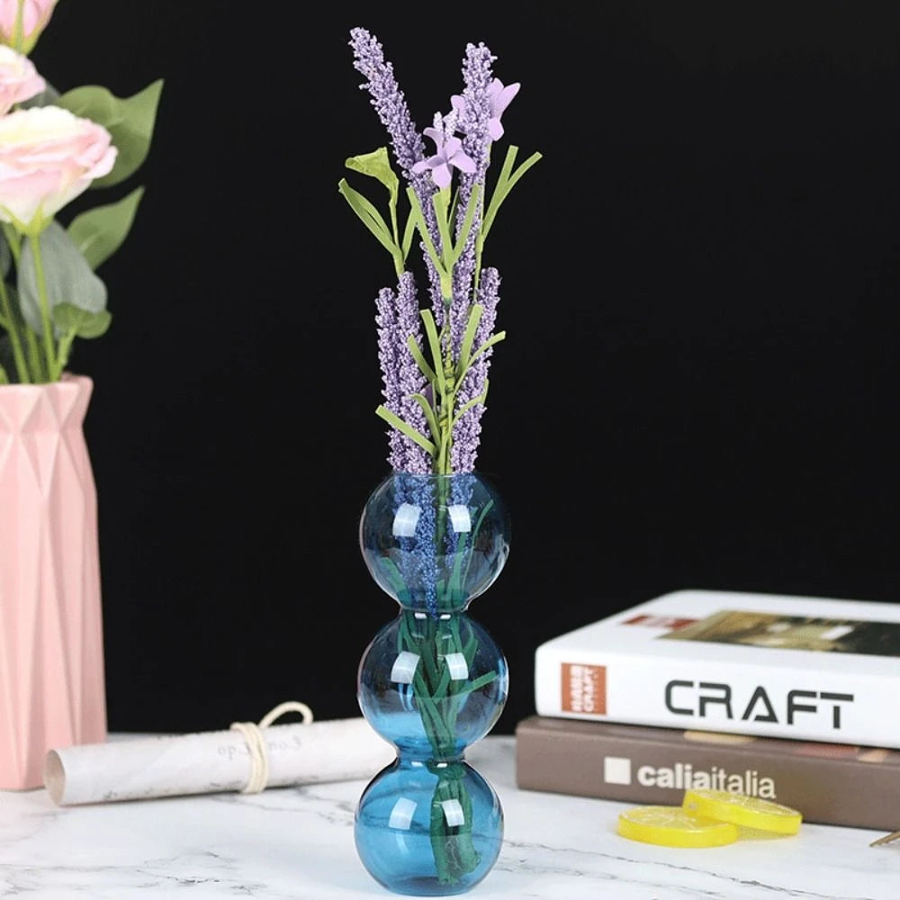vase verre moderne transparent sphères empilées rose bleu vert orange minimaliste hydroponique fleur artificielle