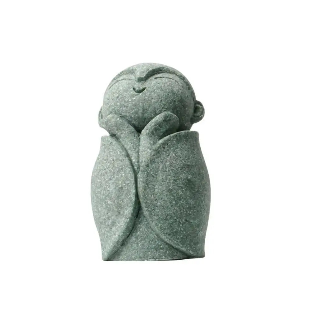 statuette bouddhiste vert clair granitée minimaliste sculptural durable extérieure intérieure ornement jardin porte bonheur
