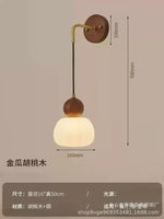 suspension lumineuse trois abatjour bois foncé blanc laiteux moderne minimaliste