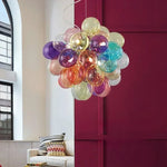 suspension lumineuse moderne transparente boules colorées violet bleu vert orange rose blanc