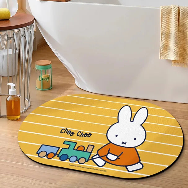 tapis bain dessin animé lapins gris jaune vert bleu rayures enfantin absorbant