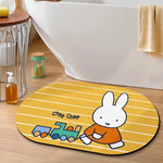 tapis bain dessin animé lapins gris jaune vert bleu rayures enfantin absorbant