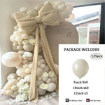 Décoration événementielle avec arche de ballons blanc sable