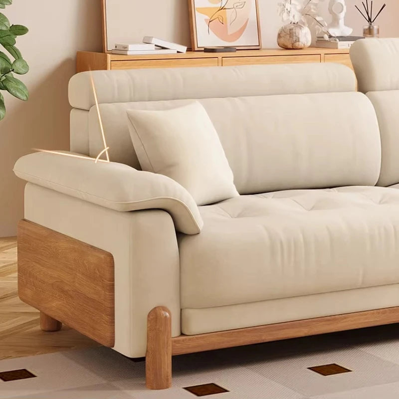canapé places minimaliste moderne beige clair coussins ajustables table basse bois textures douces surpiqures