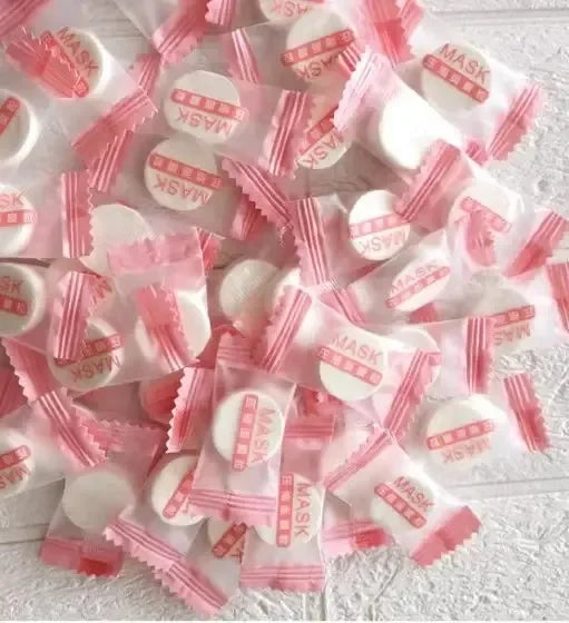 masques faciaux soins peau rose blanc texturés comprimés nettoyage beauté voyage emballages individuels semi
