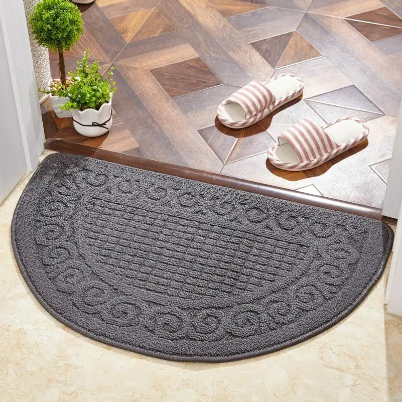 tapis sol antidérapant demi cercle texturé bordure ornée noir rouge vert marronintérieur porte