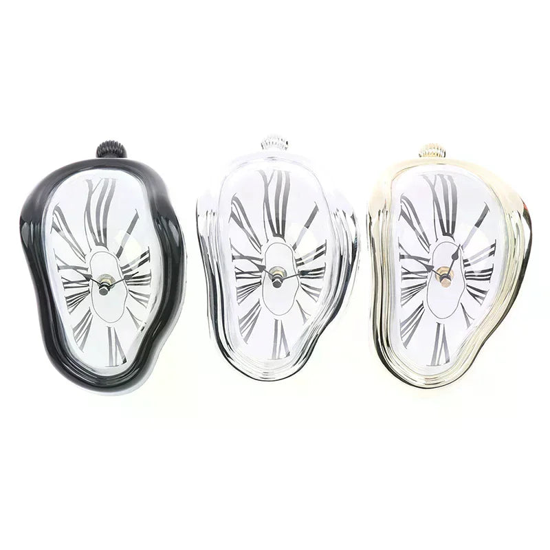 horloges murales surréalistes dali or noir argent chiffres romains aiguilles forme organique transparentes salon