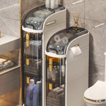 rangement salle bain moderne étages adhésif compartiments transparent beiges gris produits toilette papier serviettes