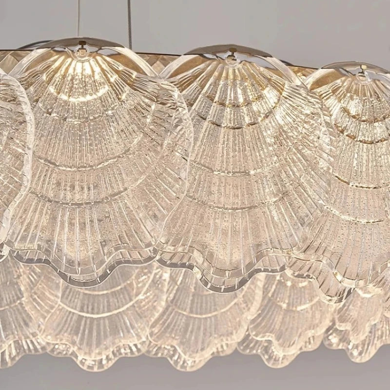 lampe suspendue moderne blanc doré coquillage translucide élégante anneaux métalliques lumière led chambre salon
