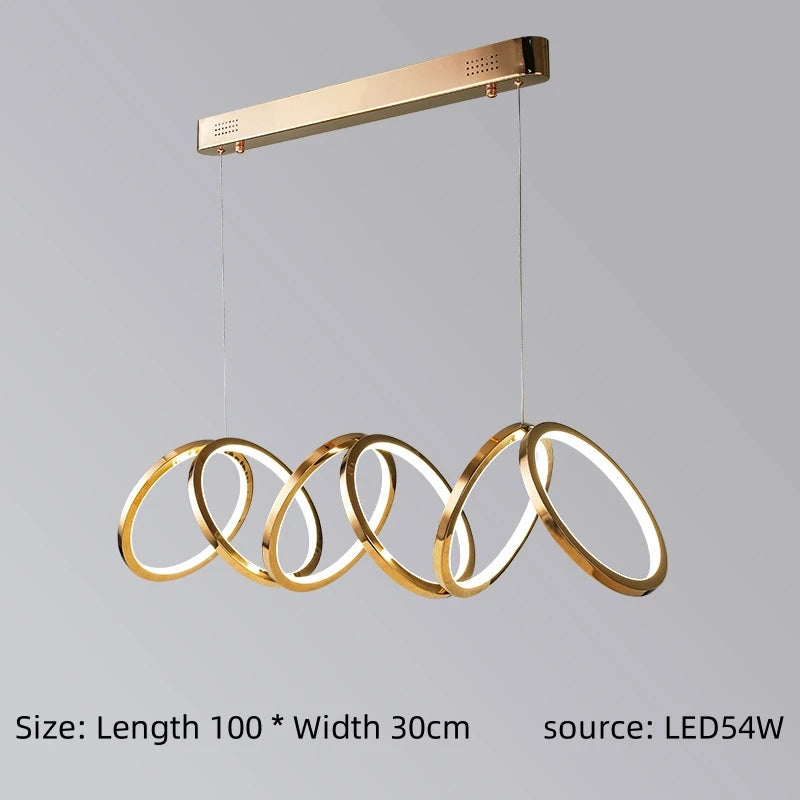 suspension lumineuse moderne or anneaux superposés salon restaurant led chambre principale