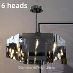 lampe suspendue moderne noir transparent facettes géométriques réfléchissantes salon restaurant chambre