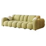 canapé d'angle moderne orange vert clair beige coussins contemporain minimaliste scandinave