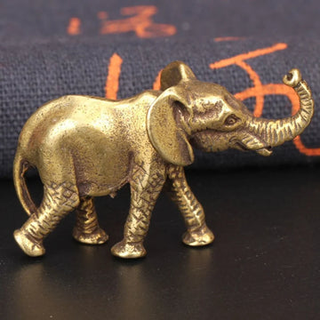 statuette éléphant bronze doré texture peau éléphant motifs floraux traditionnel asiatique décoration maison salon