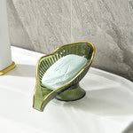 porte savon feuille transparente bord doré motif rayonné savon blanc vert orange moderne élégant