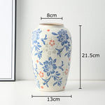 vase classique porcelaine fleurs blanc rouge bleu vert marron decoration table floral
