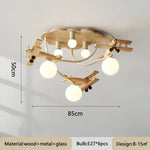 lampe bois naturel avions sphères translucides vintage moderne chambre enfants