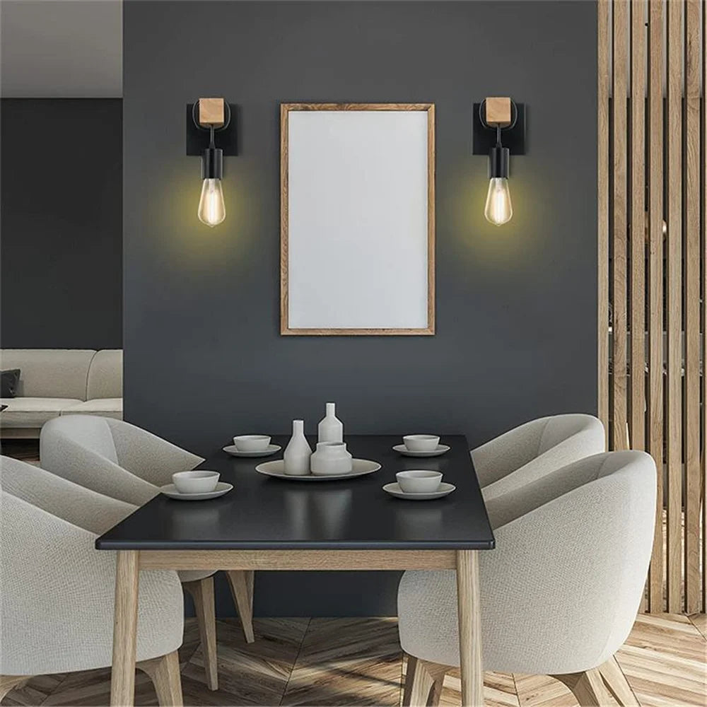 Applique murale noire installée en chevet dans une chambre à coucher