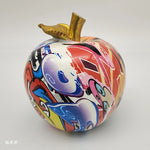 statue pomme multicolore motifs floraux abstraits résine décoration moderne contemporaine artisanale feuillette dorée
