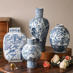 vase porcelaine chinois blanc bleu fleurs feuilles oiseaux géométrique classique floral table decoration