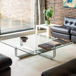 table basse moderne minimaliste transparente verre chromé pieds simples salon chambre