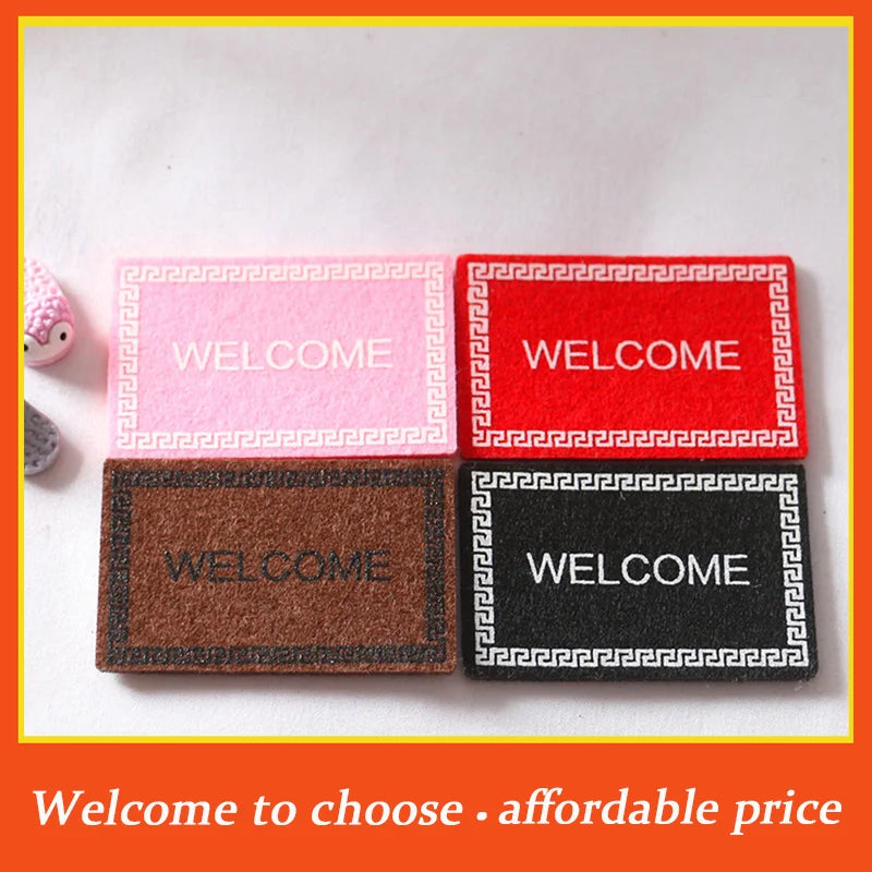 tapis d'entrée moderne rouge rose marron noir motif géométrique texturé animal nature