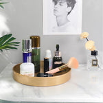 présentoir rond moderne plateau uni vert foncé orange noir maquillage soins parfums cosmétiques table