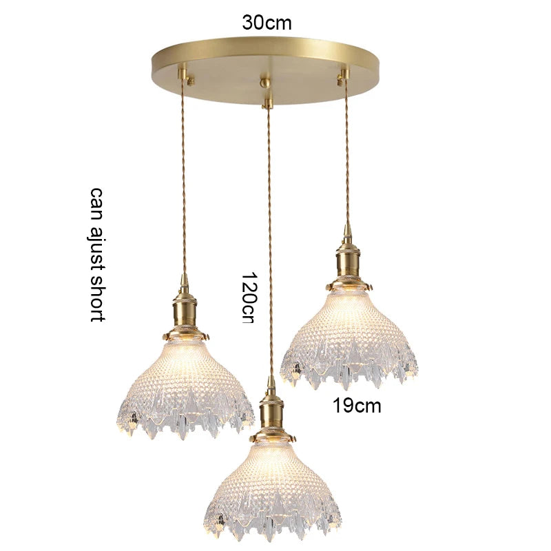 suspension lumineuse vintage vert doré motifs géométriques ampoules câbles chaînes métal