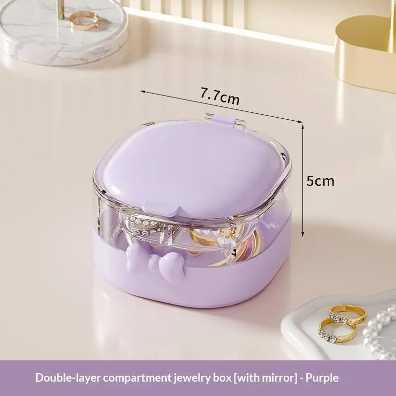 boîte bijoux moderne violet clair compartiments strass poignée élégante rose pâle beige clair