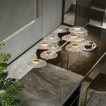 suspension lumineuse contemporaine transparente dorée ajourée salon restaurant led 4000k 3000k 6000k