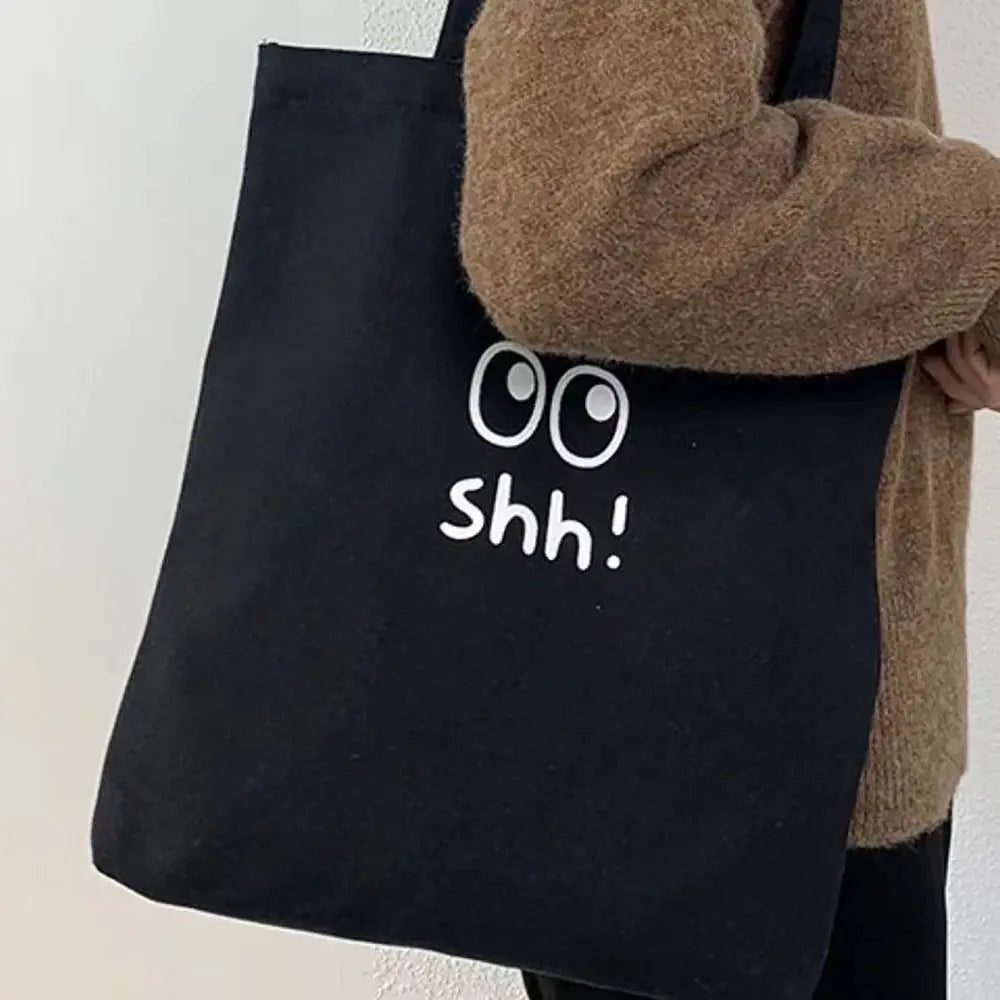 sac main toile dessin animé yeux grands ouverts shh décontracté noir beige doux