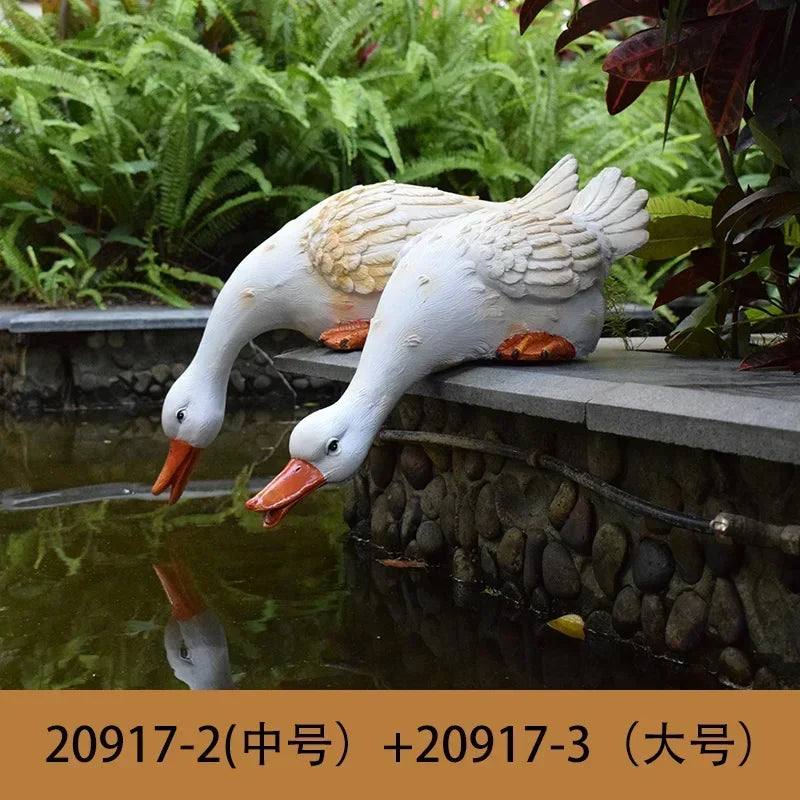 statue canard blanc plumes orange piscine jardin décoration extérieure animaux ornements paysagistes fleurs artificielles