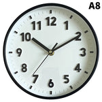 horloge murale moderne bleu clair vert pastel rose pâle jaune violet noir blanc chiffres