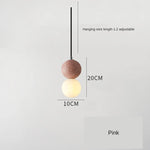 suspension lumineuse moderne ampoules led blanc noir rose gris texture granulée câble suspendu minimaliste