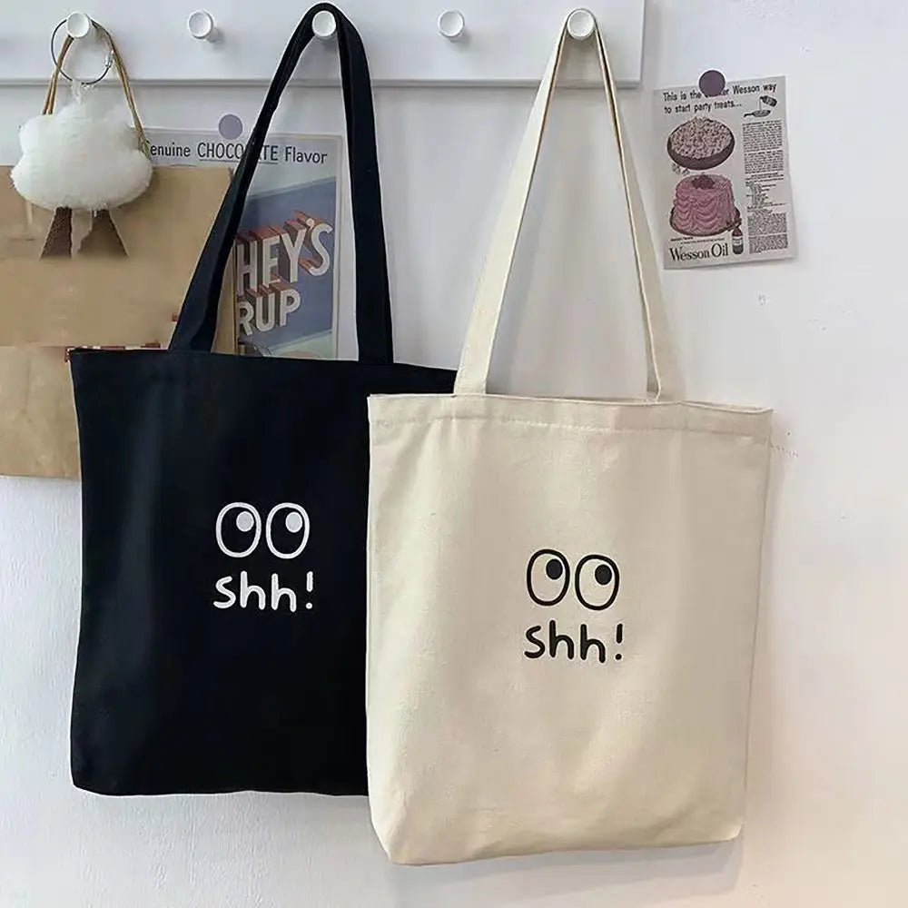 sac main toile dessin animé yeux grands ouverts shh décontracté noir beige doux