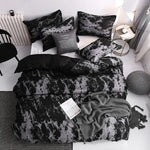 ensemble literie moderne motif marbré abstrait noir blanc pièces duvet taies d'oreiller
